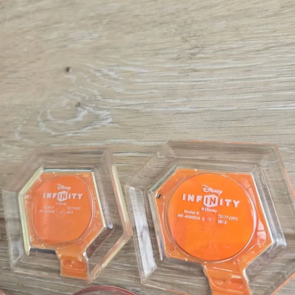 Disney Infinity power disc's lot of 11 Mulan, mickey, rapunzel, Alice, Nemo, car